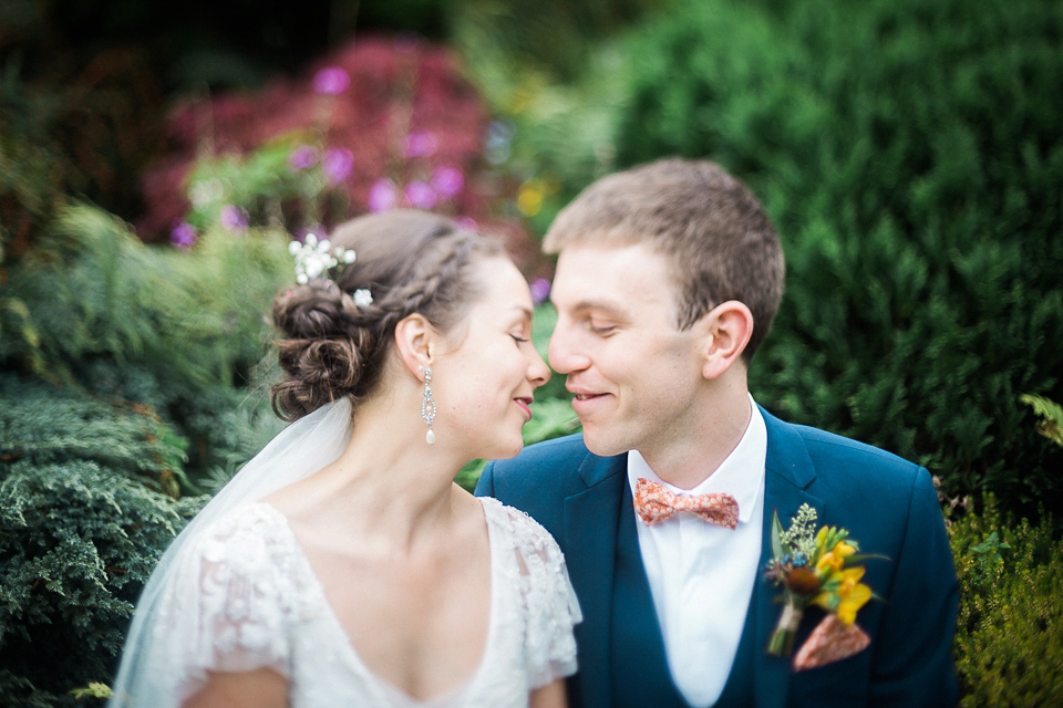 Holly wore an Eliza Jane Howell gown for her colourful, outdoor wedding in Scotland. Images by Solen Photography.