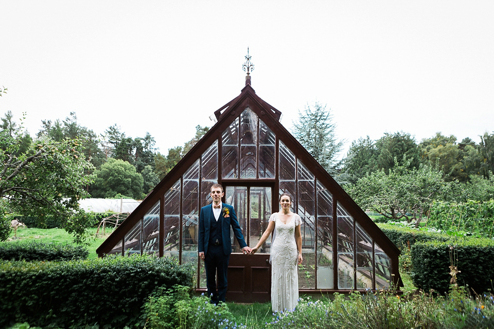 Holly wore an Eliza Jane Howell gown for her colourful, outdoor wedding in Scotland. Images by Solen Photography.