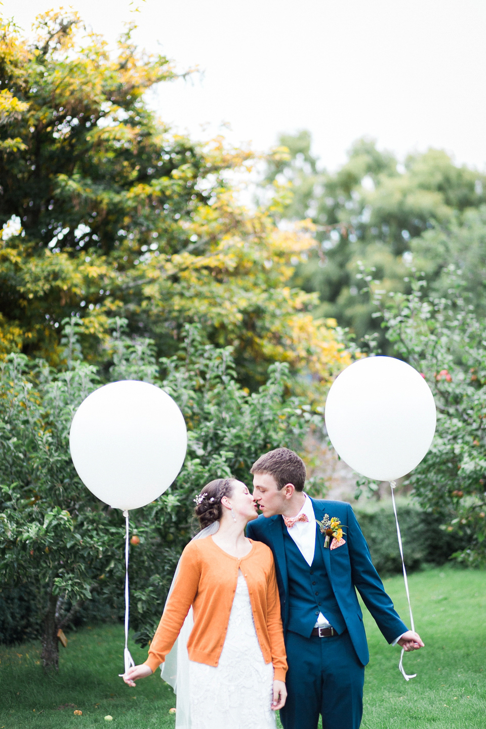 Holly wore an Eliza Jane Howell gown for her colourful, outdoor wedding in Scotland. Images by Solen Photography.