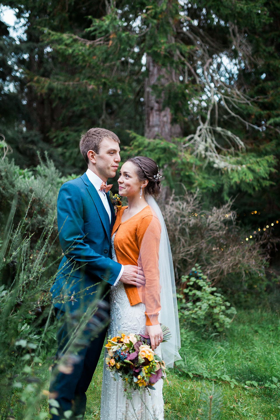 Holly wore an Eliza Jane Howell gown for her colourful, outdoor wedding in Scotland. Images by Solen Photography.