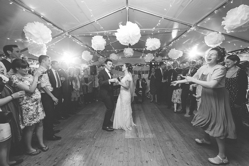 Holly wore an Eliza Jane Howell gown for her colourful, outdoor wedding in Scotland. Images by Solen Photography.