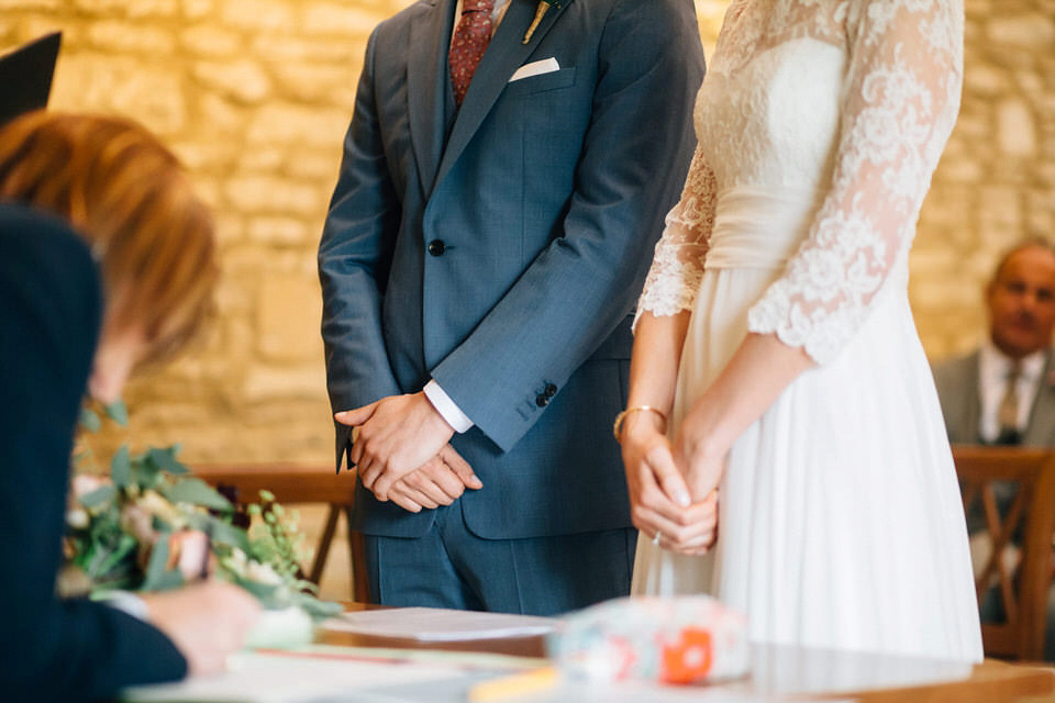 Katie wore a bespoke gown by London based designer Shanna Melville for her romantic Autumn wedding in the Cotswolds. Photography by Joseph Hall.