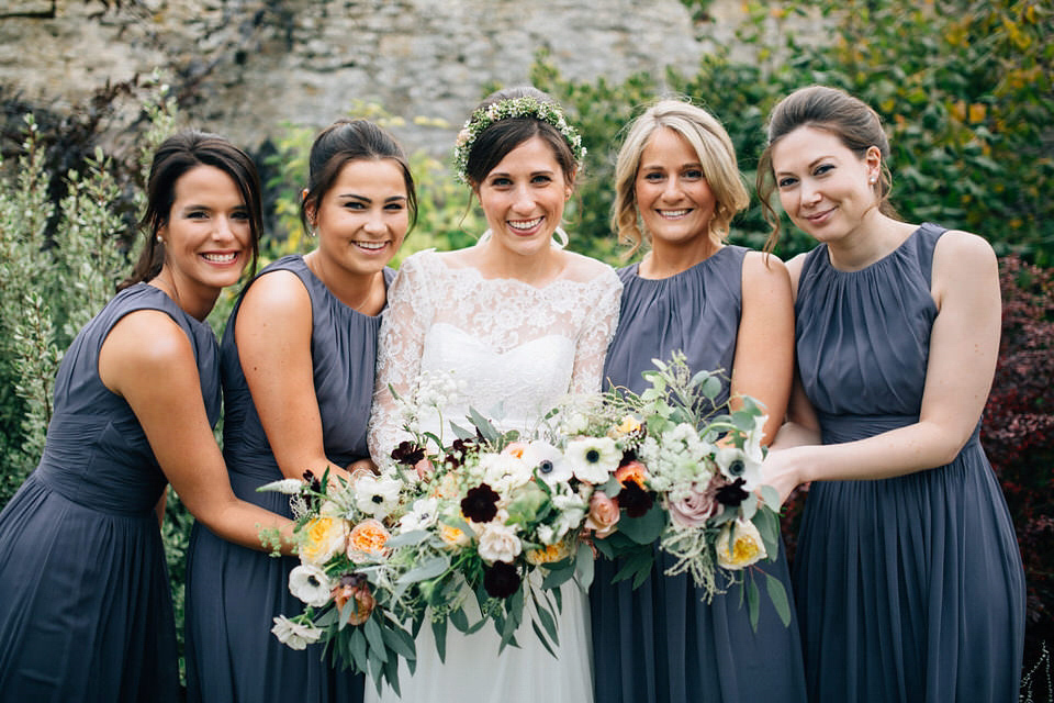 Katie wore a bespoke gown by London based designer Shanna Melville for her romantic Autumn wedding in the Cotswolds. Photography by Joseph Hall.