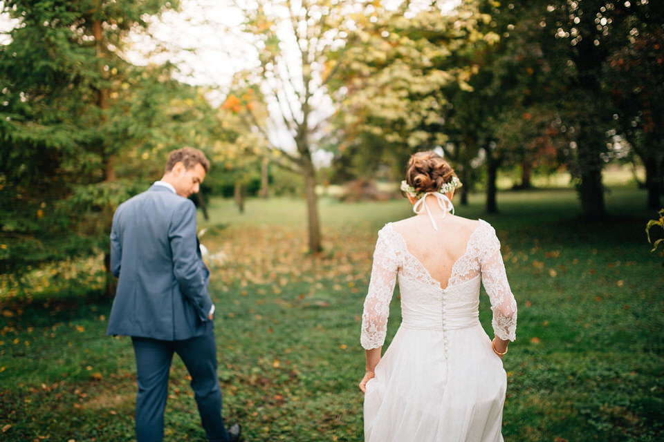 Katie wore a bespoke gown by London based designer Shanna Melville for her romantic Autumn wedding in the Cotswolds. Photography by Joseph Hall.