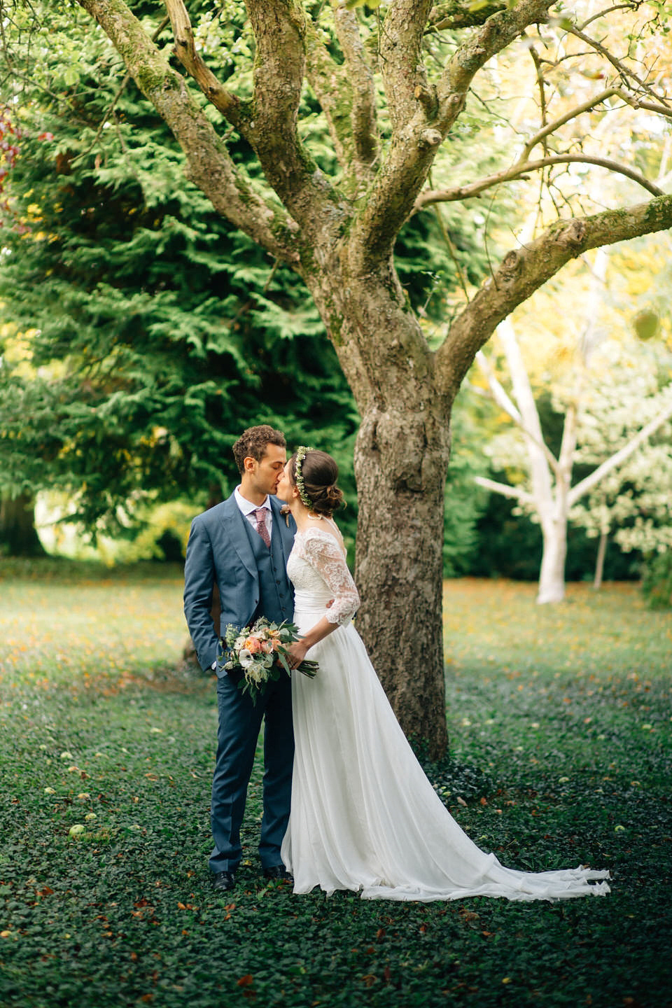 Katie wore a bespoke gown by London based designer Shanna Melville for her romantic Autumn wedding in the Cotswolds. Photography by Joseph Hall.