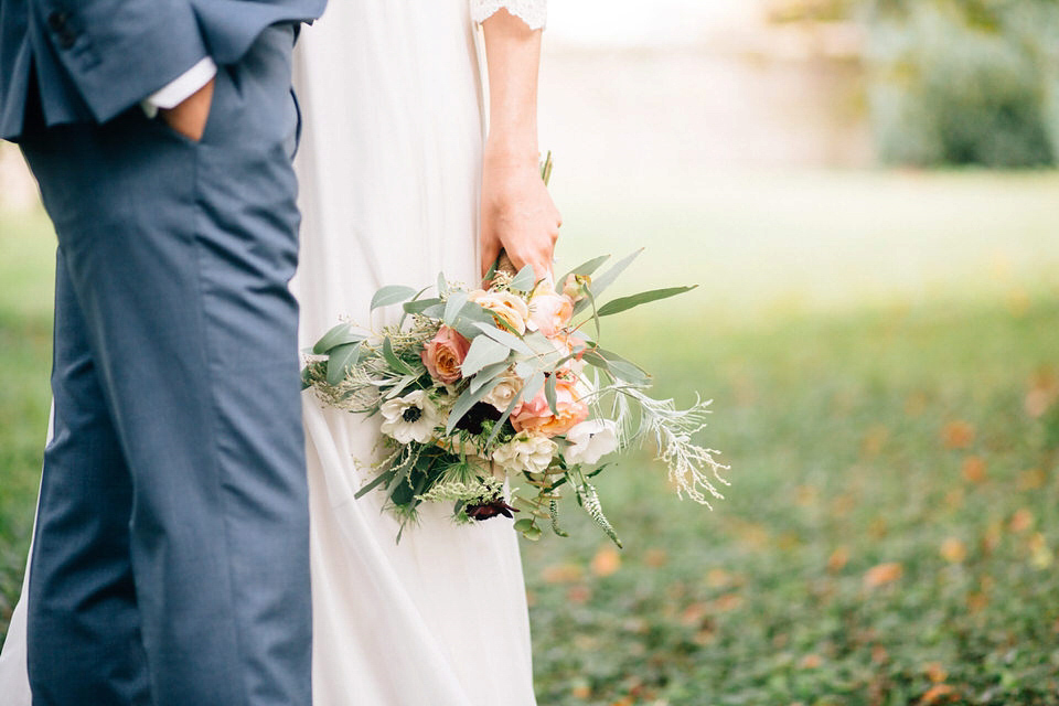 Katie wore a bespoke gown by London based designer Shanna Melville for her romantic Autumn wedding in the Cotswolds. Photography by Joseph Hall.