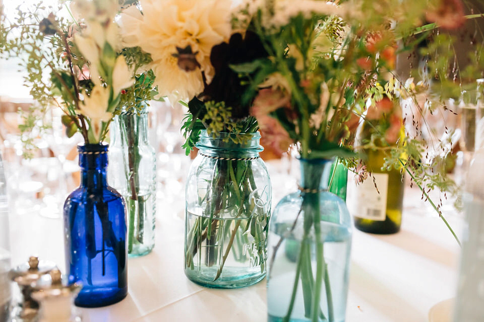 Katie wore a bespoke gown by London based designer Shanna Melville for her romantic Autumn wedding in the Cotswolds. Photography by Joseph Hall.