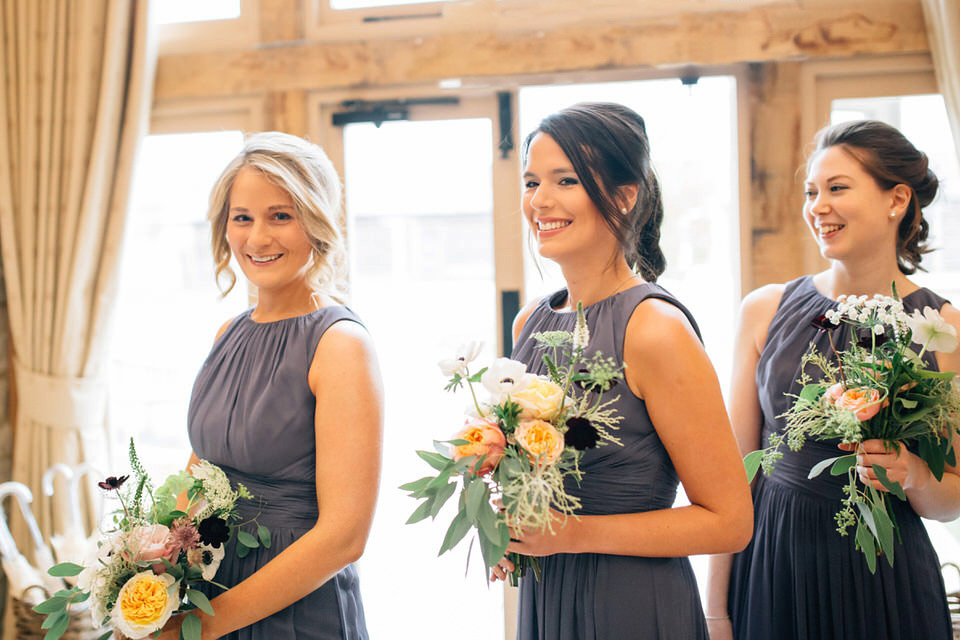 Katie wore a bespoke gown by London based designer Shanna Melville for her romantic Autumn wedding in the Cotswolds. Photography by Joseph Hall.