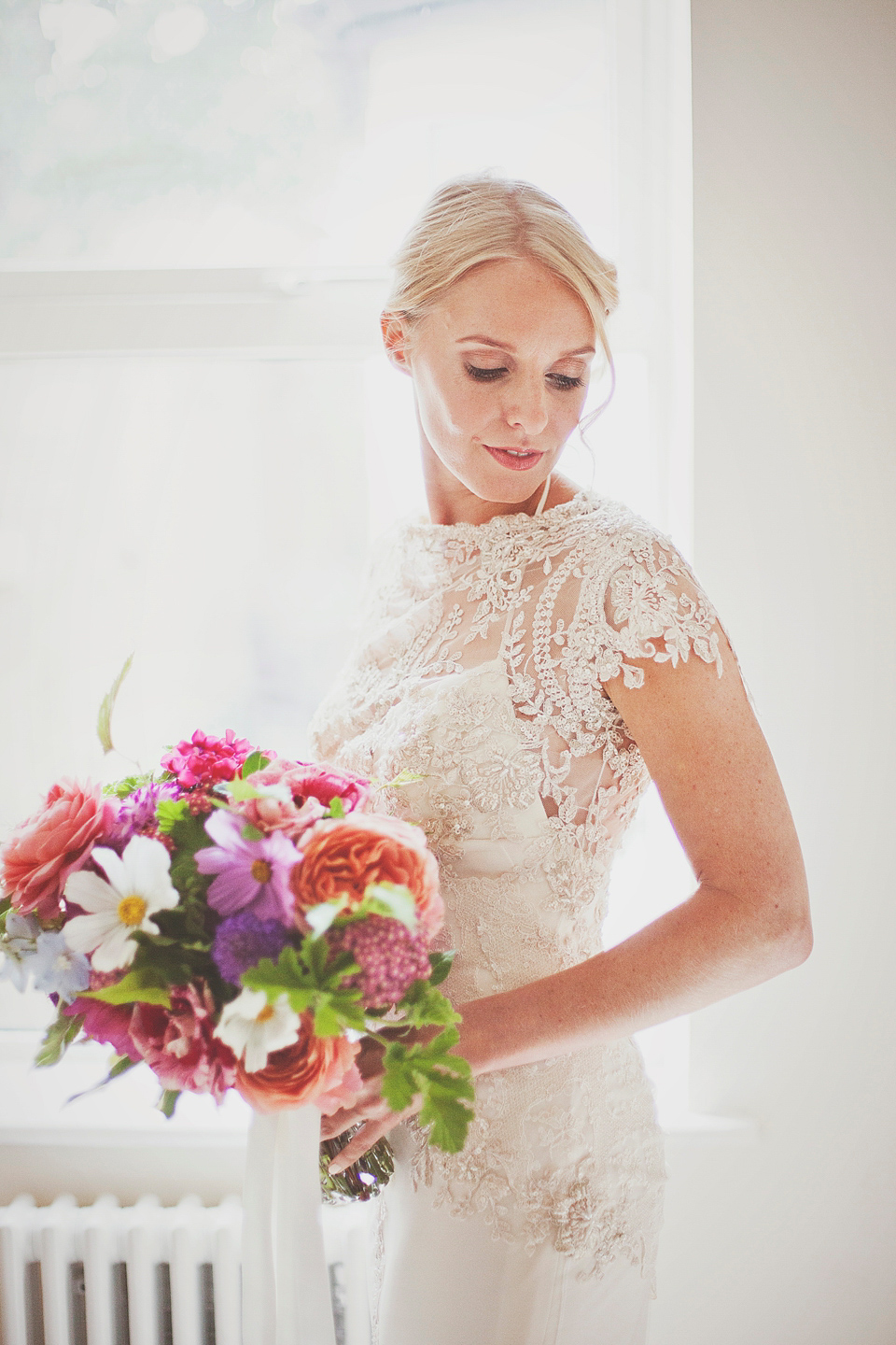 Irma wore a YolanCris gown for her cool, modern wedding at The Asylum in East London. Photography by On Love and Photography.