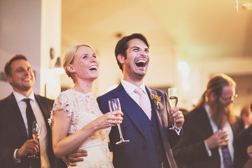 Irma wore a YolanCris gown for her cool, modern wedding at The Asylum in East London. Photography by On Love and Photography.