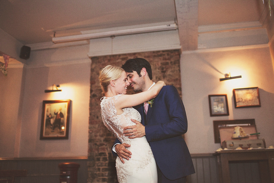 Irma wore a YolanCris gown for her cool, modern wedding at The Asylum in East London. Photography by On Love and Photography.