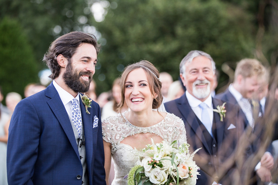 Laura wears a Maggie Sottero gown for her outdoor wedding at Natural Retreats at Richmond in the Yorkshire Dales. Photography by Lee Scullion.