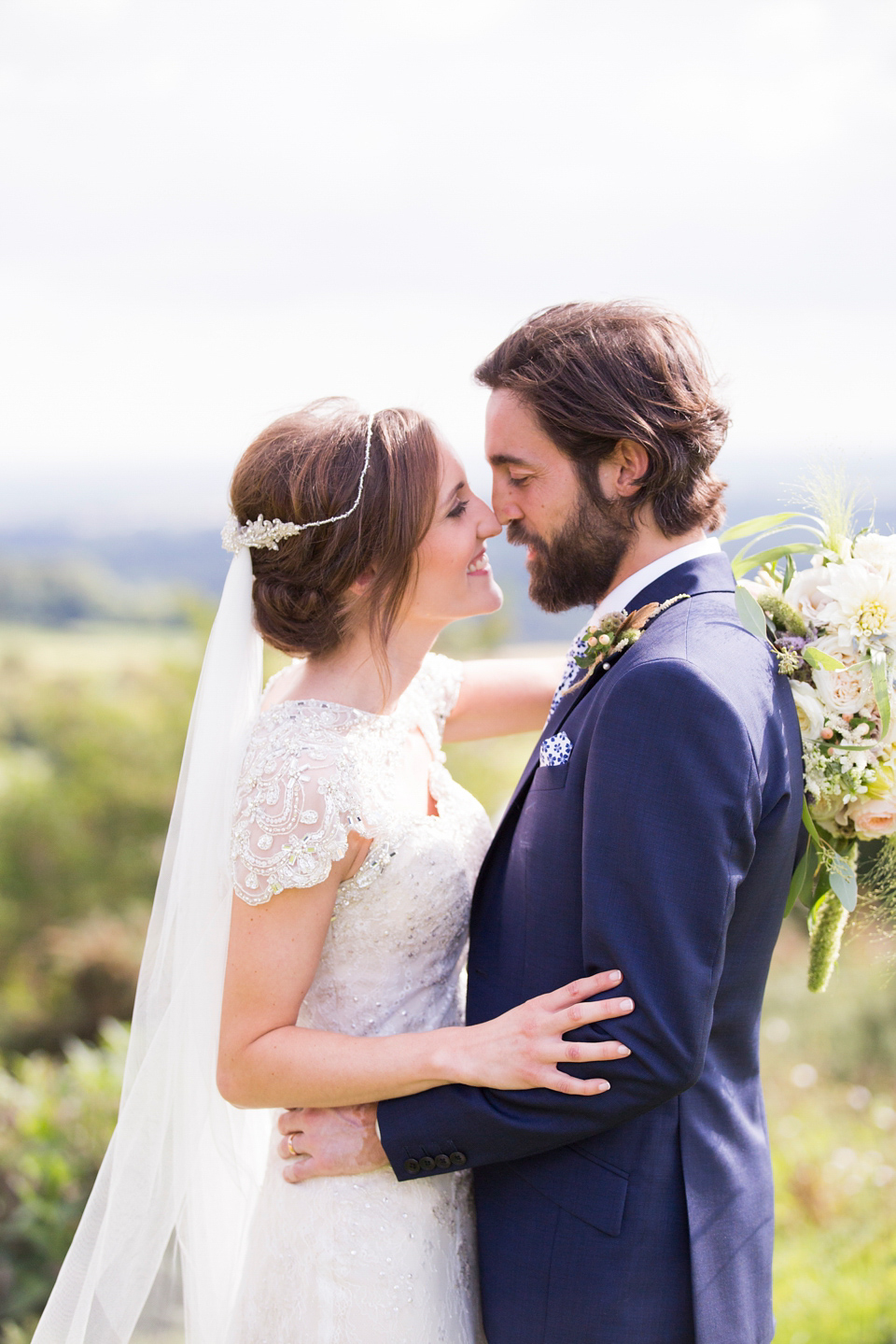 Laura wears a Maggie Sottero gown for her outdoor wedding at Natural Retreats at Richmond in the Yorkshire Dales. Photography by Lee Scullion.