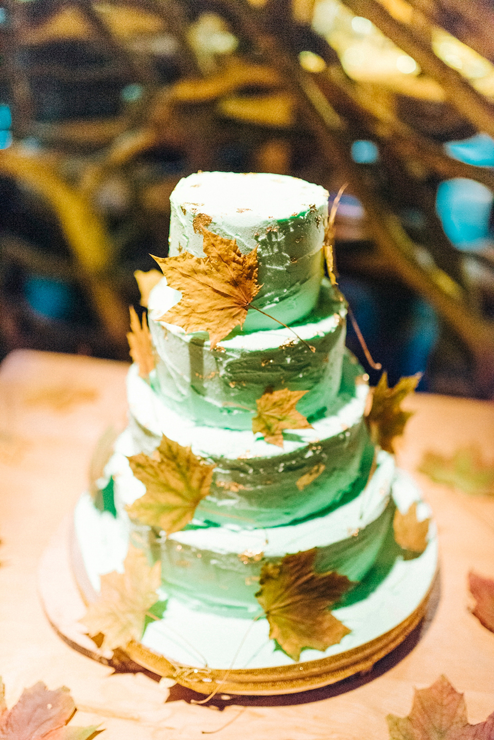 Mint, pink and golden snitches for a magical Autumn wedding in a treehouse. Photography by Sarah Jane Ethan.