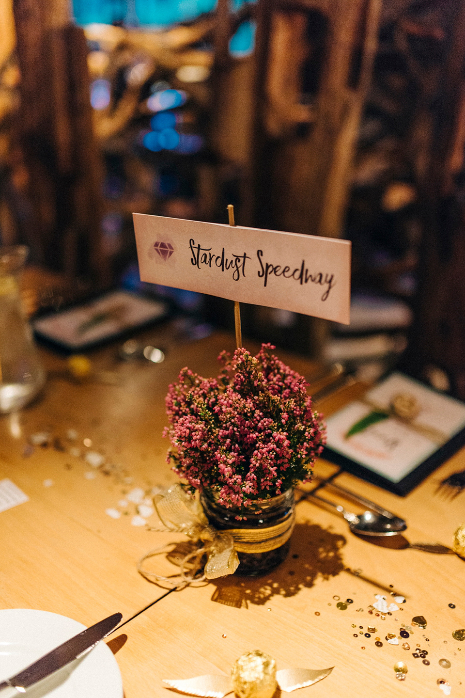 Mint, pink and golden snitches for a magical Autumn wedding in a treehouse. Photography by Sarah Jane Ethan.