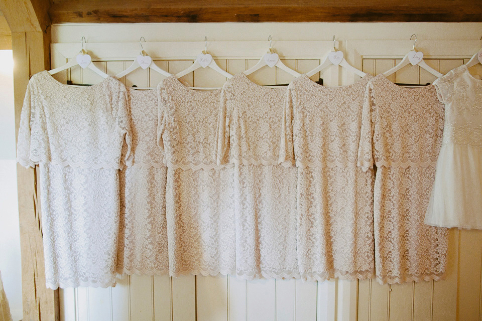 An elegant and quintessentially English village hall wedding in the Cotswolds. Bride Claire wore Ellis Bridals. Photography by David Jenkins.