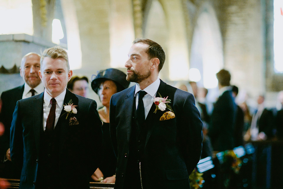 An elegant and quintessentially English village hall wedding in the Cotswolds. Bride Claire wore Ellis Bridals. Photography by David Jenkins.