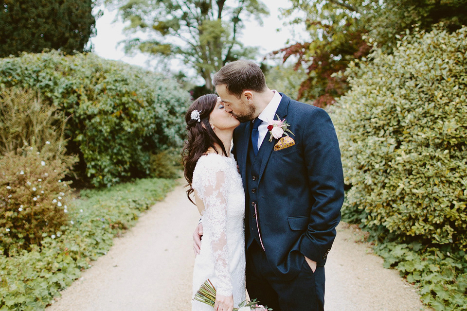 An elegant and quintessentially English village hall wedding in the Cotswolds. Bride Claire wore Ellis Bridals. Photography by David Jenkins.