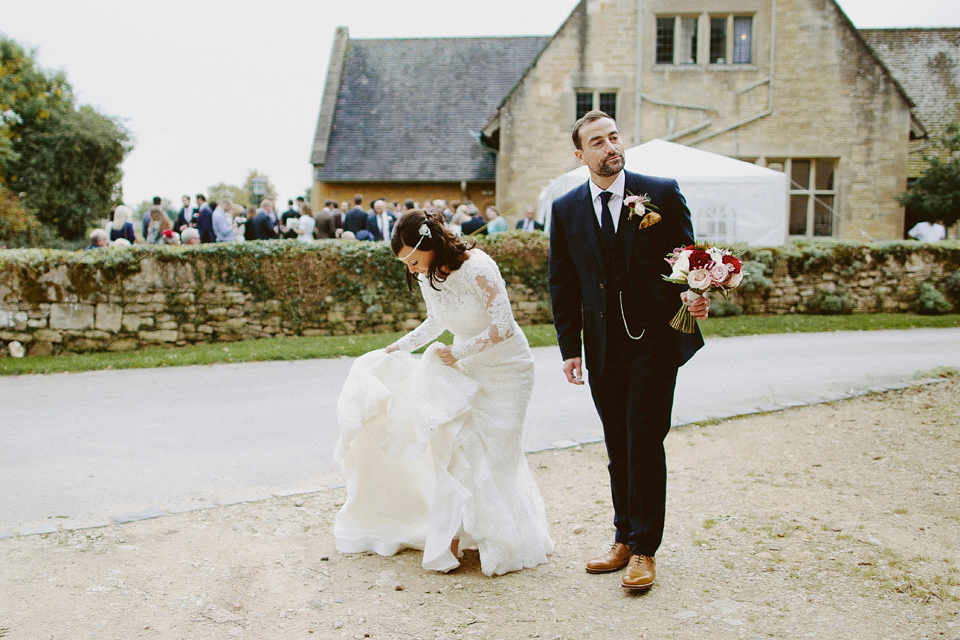 An elegant and quintessentially English village hall wedding in the Cotswolds. Bride Claire wore Ellis Bridals. Photography by David Jenkins.