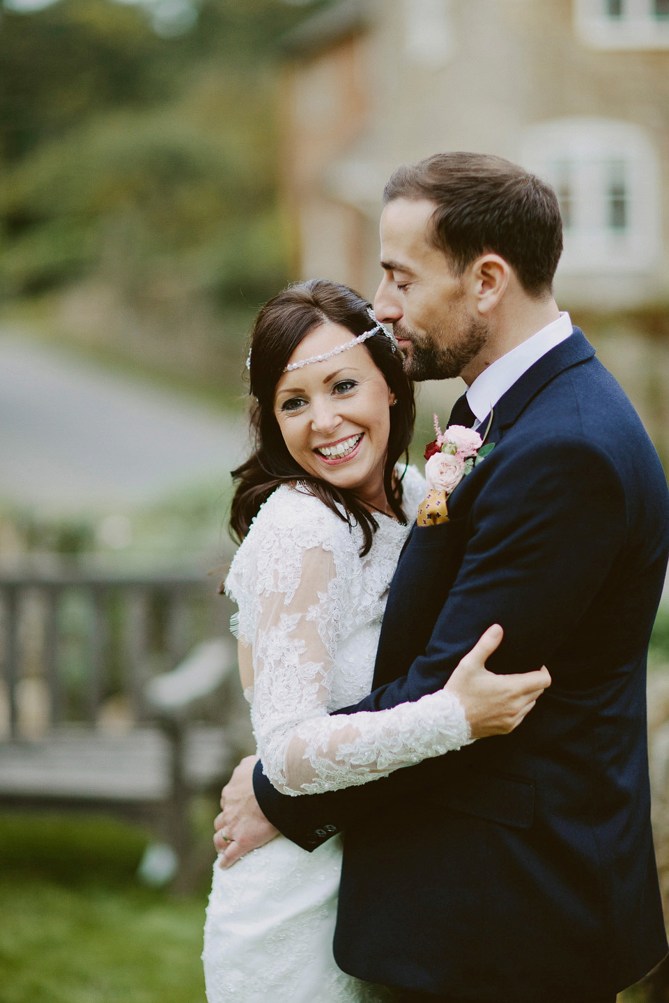 An elegant and quintessentially English village hall wedding in the Cotswolds. Bride Claire wore Ellis Bridals. Photography by David Jenkins.