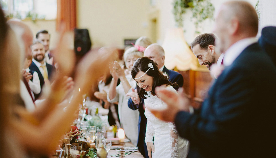 An elegant and quintessentially English village hall wedding in the Cotswolds. Bride Claire wore Ellis Bridals. Photography by David Jenkins.