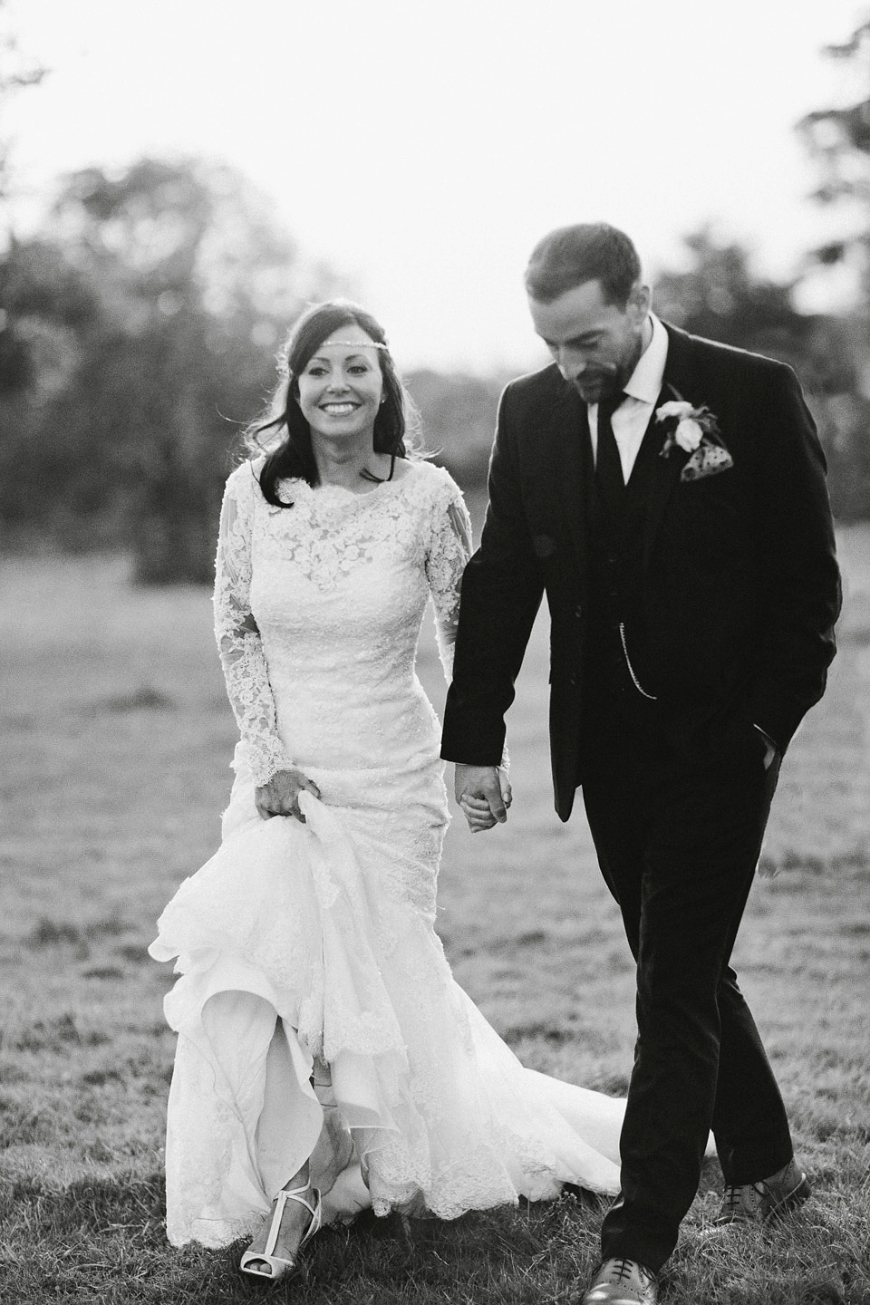 An elegant and quintessentially English village hall wedding in the Cotswolds. Bride Claire wore Ellis Bridals. Photography by David Jenkins.