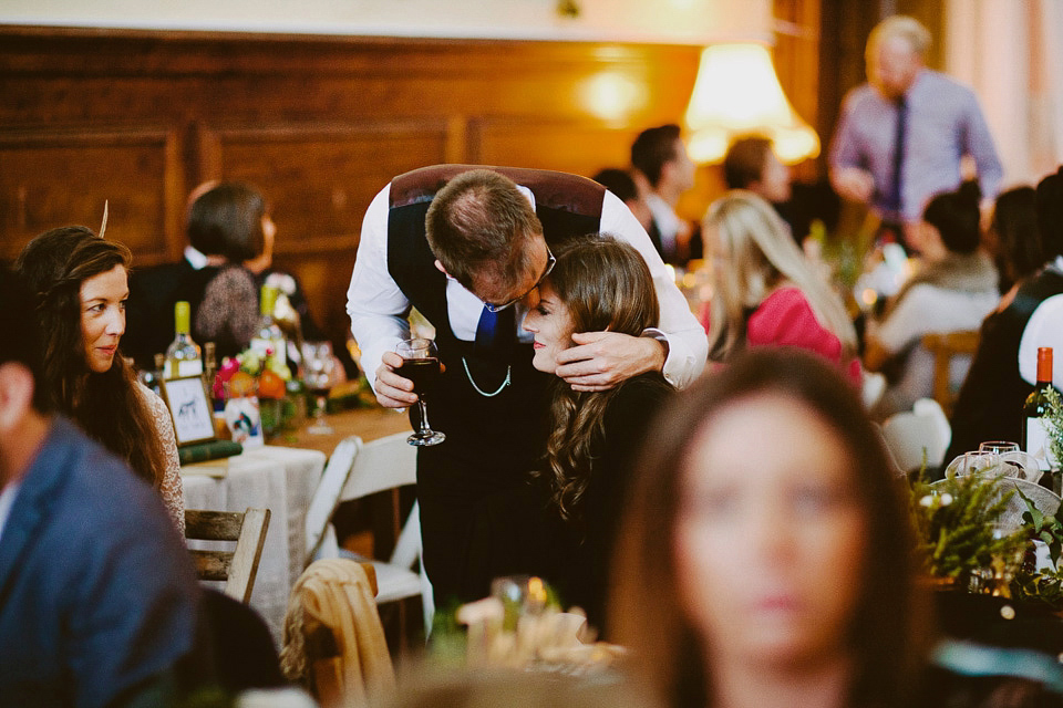 An elegant and quintessentially English village hall wedding in the Cotswolds. Bride Claire wore Ellis Bridals. Photography by David Jenkins.