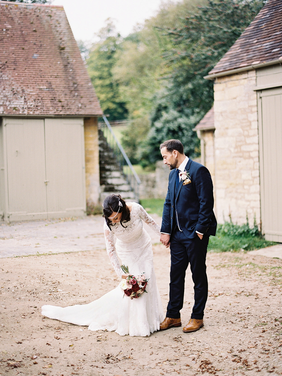 An elegant and quintessentially English village hall wedding in the Cotswolds. Bride Claire wore Ellis Bridals. Photography by David Jenkins.
