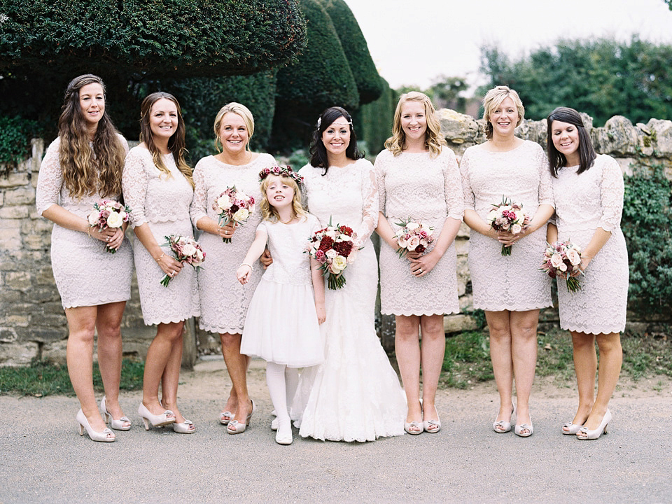 An elegant and quintessentially English village hall wedding in the Cotswolds. Bride Claire wore Ellis Bridals. Photography by David Jenkins.