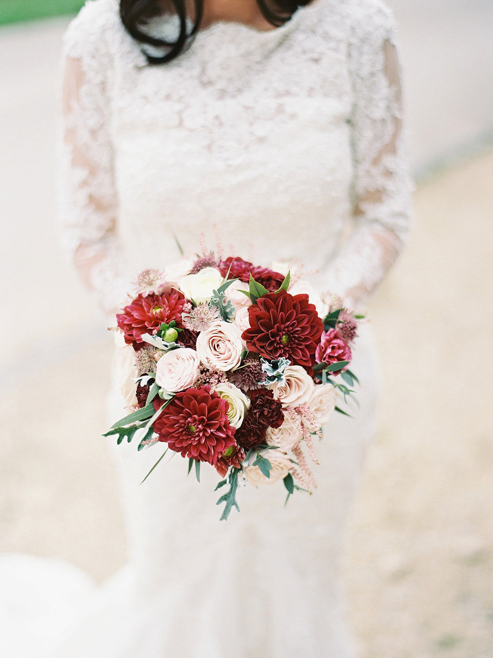 An elegant and quintessentially English village hall wedding in the Cotswolds. Bride Claire wore Ellis Bridals. Photography by David Jenkins.