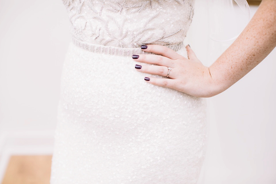 The bride wore a Karen Willis Holmes gown for her London wedding in shades of green. Photography by Alex Wysocki.