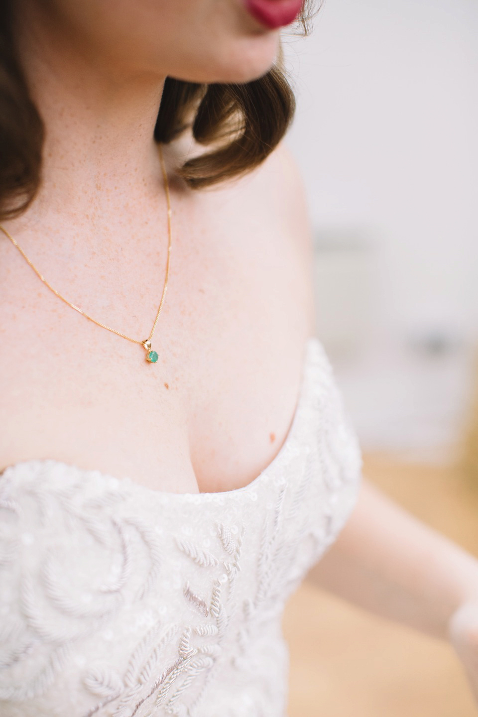 The bride wore a Karen Willis Holmes gown for her London wedding in shades of green. Photography by Alex Wysocki.