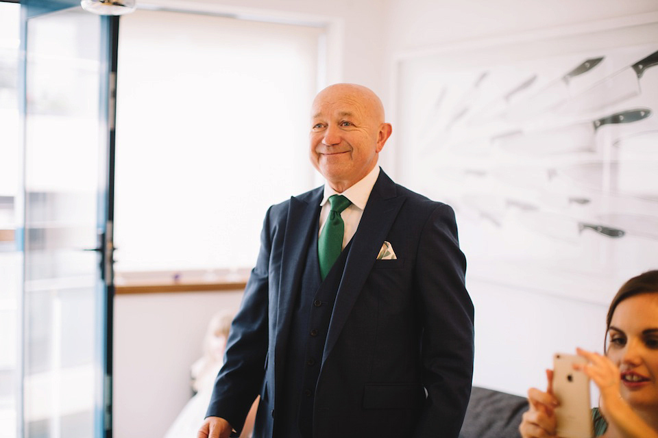 The bride wore a Karen Willis Holmes gown for her London wedding in shades of green. Photography by Alex Wysocki.