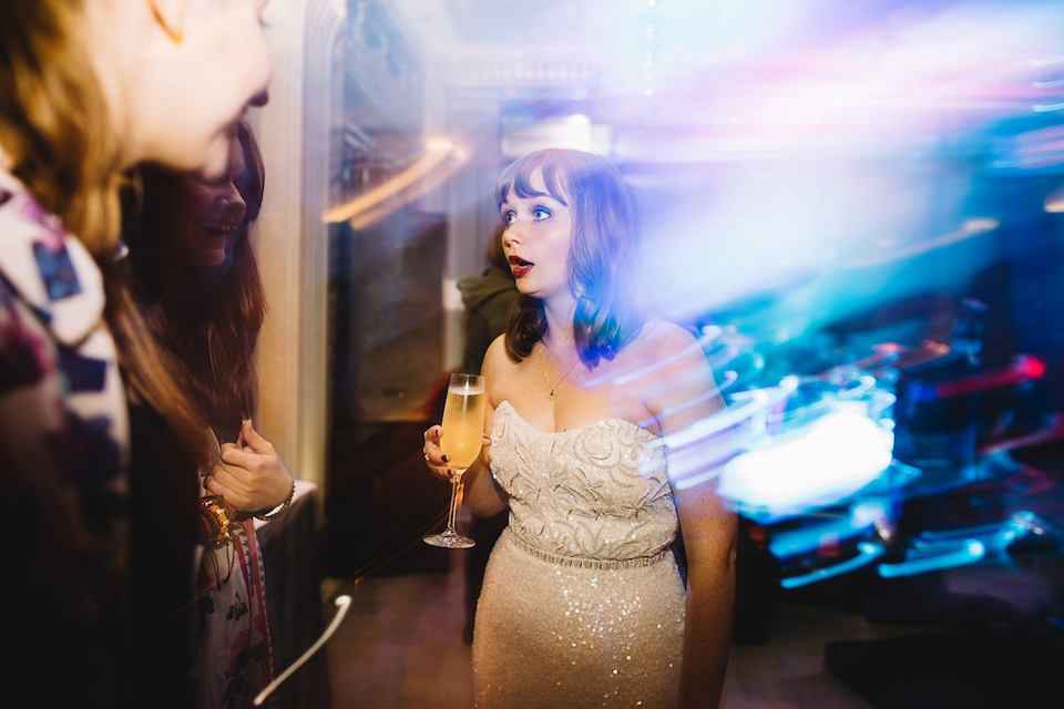 The bride wore a Karen Willis Holmes gown for her London wedding in shades of green. Photography by Alex Wysocki.