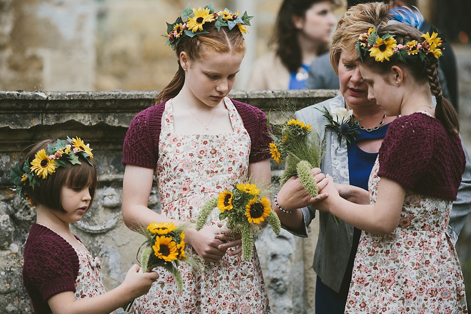 Sunflowers and rustic, Autumn shades for a handmade wedding in the Cotswolds. Photography by McKinley Rodgers.