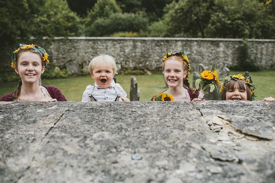 Sunflowers and rustic, Autumn shades for a handmade wedding in the Cotswolds. Photography by McKinley Rodgers.