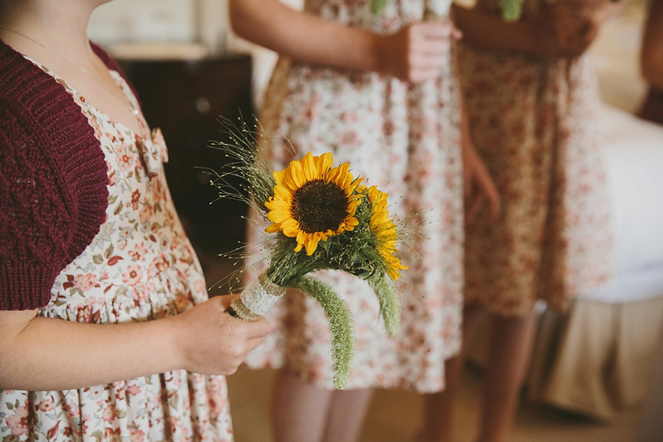 Sunflowers and rustic, Autumn shades for a handmade wedding in the Cotswolds. Photography by McKinley Rodgers.