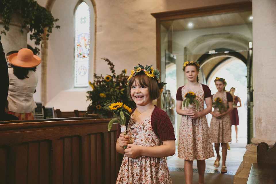 Sunflowers and rustic, Autumn shades for a handmade wedding in the Cotswolds. Photography by McKinley Rodgers.