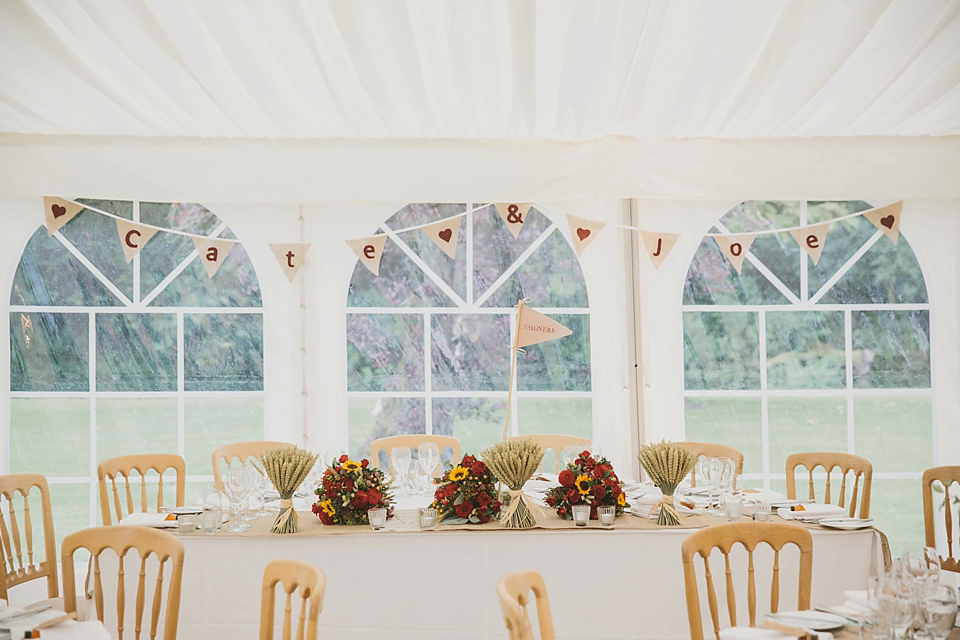 Sunflowers and rustic, Autumn shades for a handmade wedding in the Cotswolds. Photography by McKinley Rodgers.