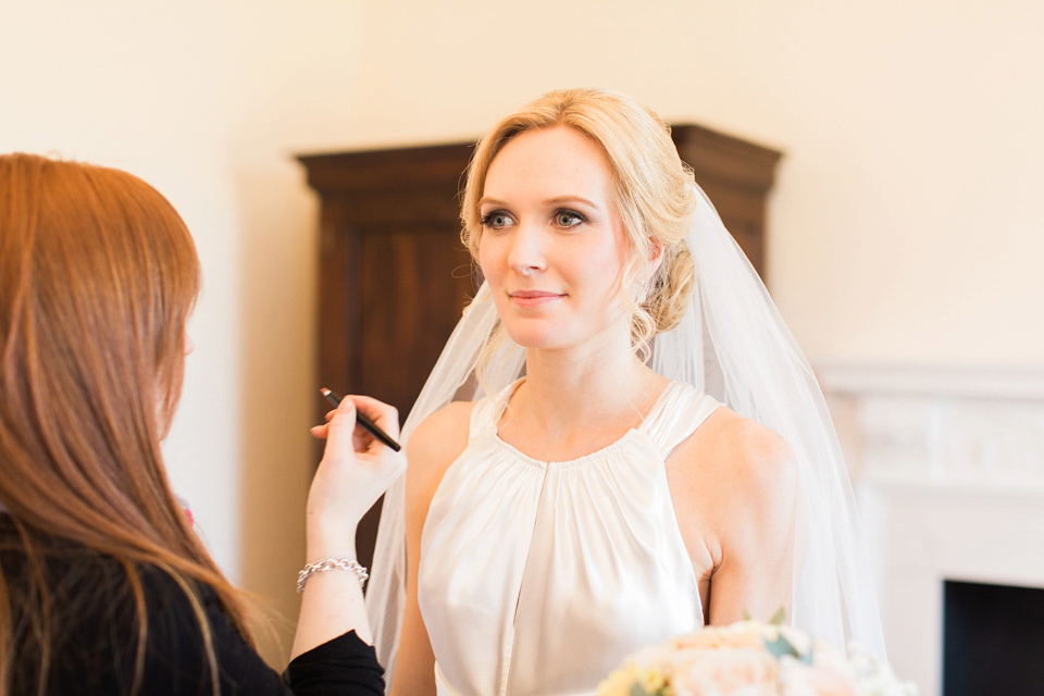 Bride Nicky wore an Amnada Wakeley gown for her pastel coloured, Spring time wedding at Botleys Mansion. Photography by Helen Cawte.