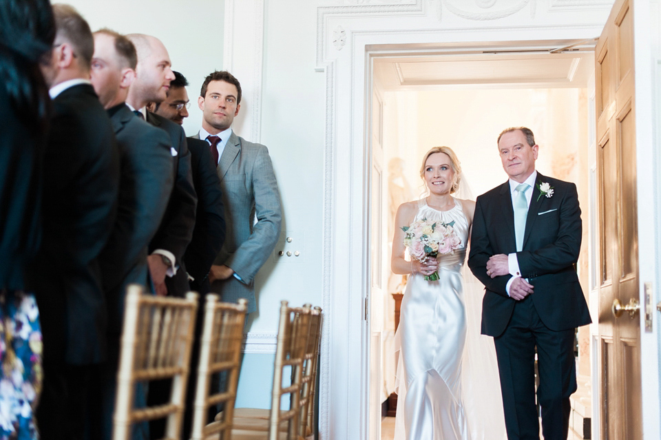 Bride Nicky wore an Amnada Wakeley gown for her pastel coloured, Spring time wedding at Botleys Mansion. Photography by Helen Cawte.