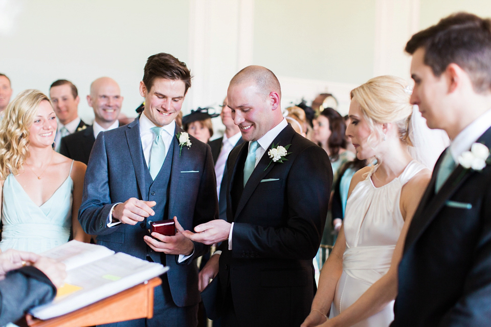 Bride Nicky wore an Amnada Wakeley gown for her pastel coloured, Spring time wedding at Botleys Mansion. Photography by Helen Cawte.