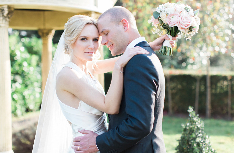 Bride Nicky wore an Amnada Wakeley gown for her pastel coloured, Spring time wedding at Botleys Mansion. Photography by Helen Cawte.