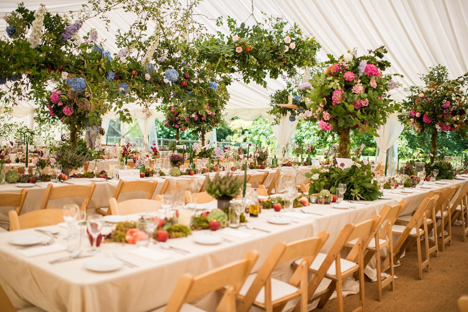 Bride Lou Lou wears a Mori Lee gown for her Sherborne Abbey wedding and garden party reception. Photography by Louise Adby.