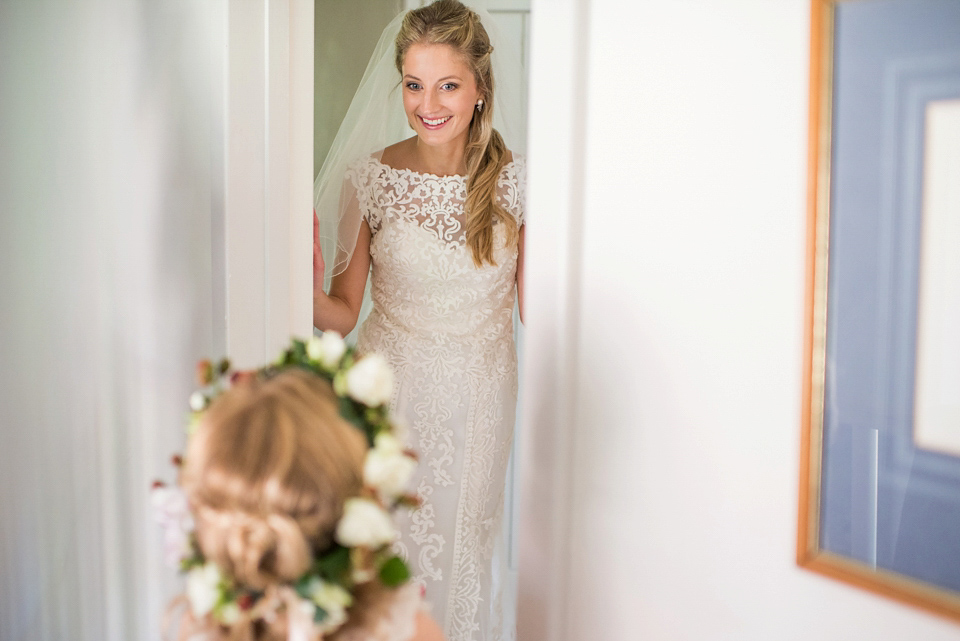 Bride Lou Lou wears a Mori Lee gown for her Sherborne Abbey wedding and garden party reception. Photography by Louise Adby.