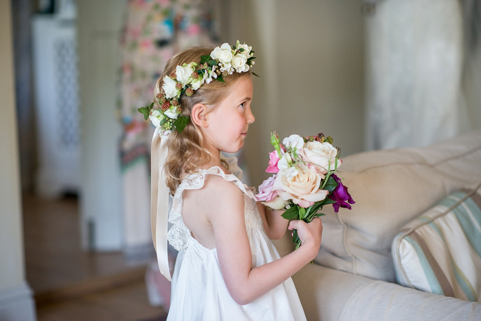 Bride Lou Lou wears a Mori Lee gown for her Sherborne Abbey wedding and garden party reception. Photography by Louise Adby.