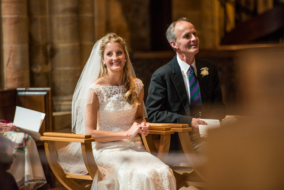 Bride Lou Lou wears a Mori Lee gown for her Sherborne Abbey wedding and garden party reception. Photography by Louise Adby.