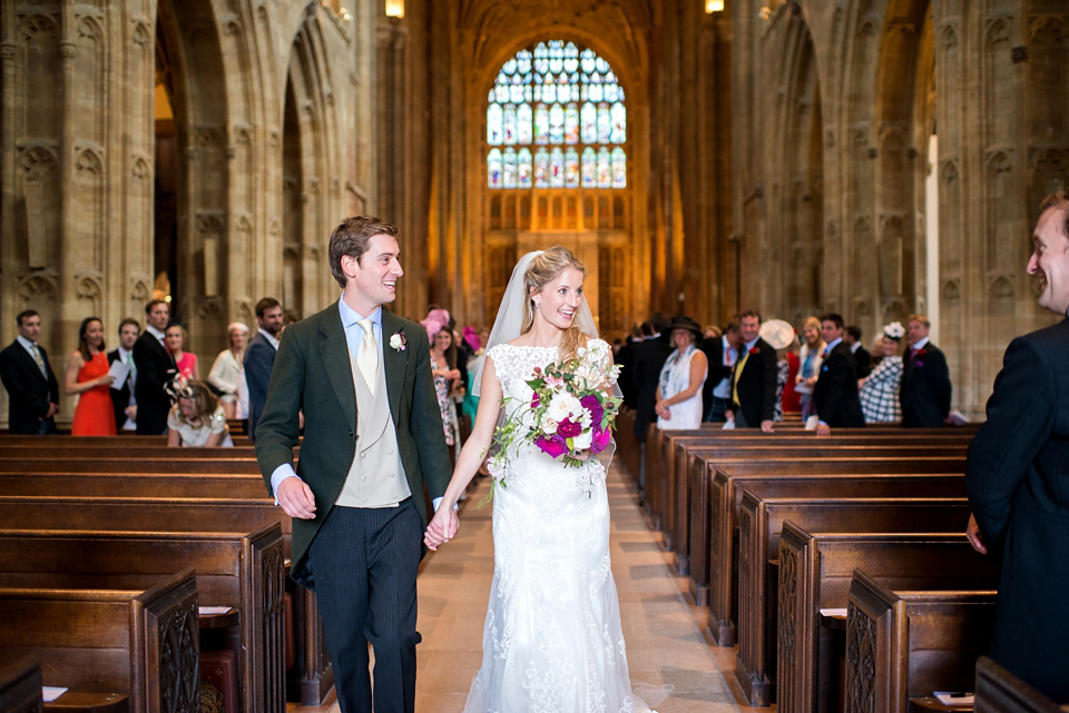 Bride Lou Lou wears a Mori Lee gown for her Sherborne Abbey wedding and garden party reception. Photography by Louise Adby.