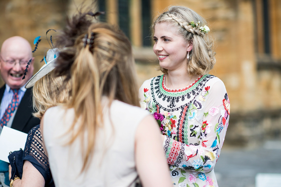 Bride Lou Lou wears a Mori Lee gown for her Sherborne Abbey wedding and garden party reception. Photography by Louise Adby.