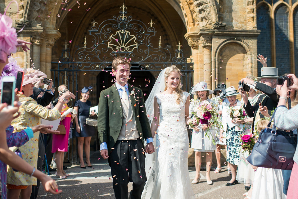 Bride Lou Lou wears a Mori Lee gown for her Sherborne Abbey wedding and garden party reception. Photography by Louise Adby.